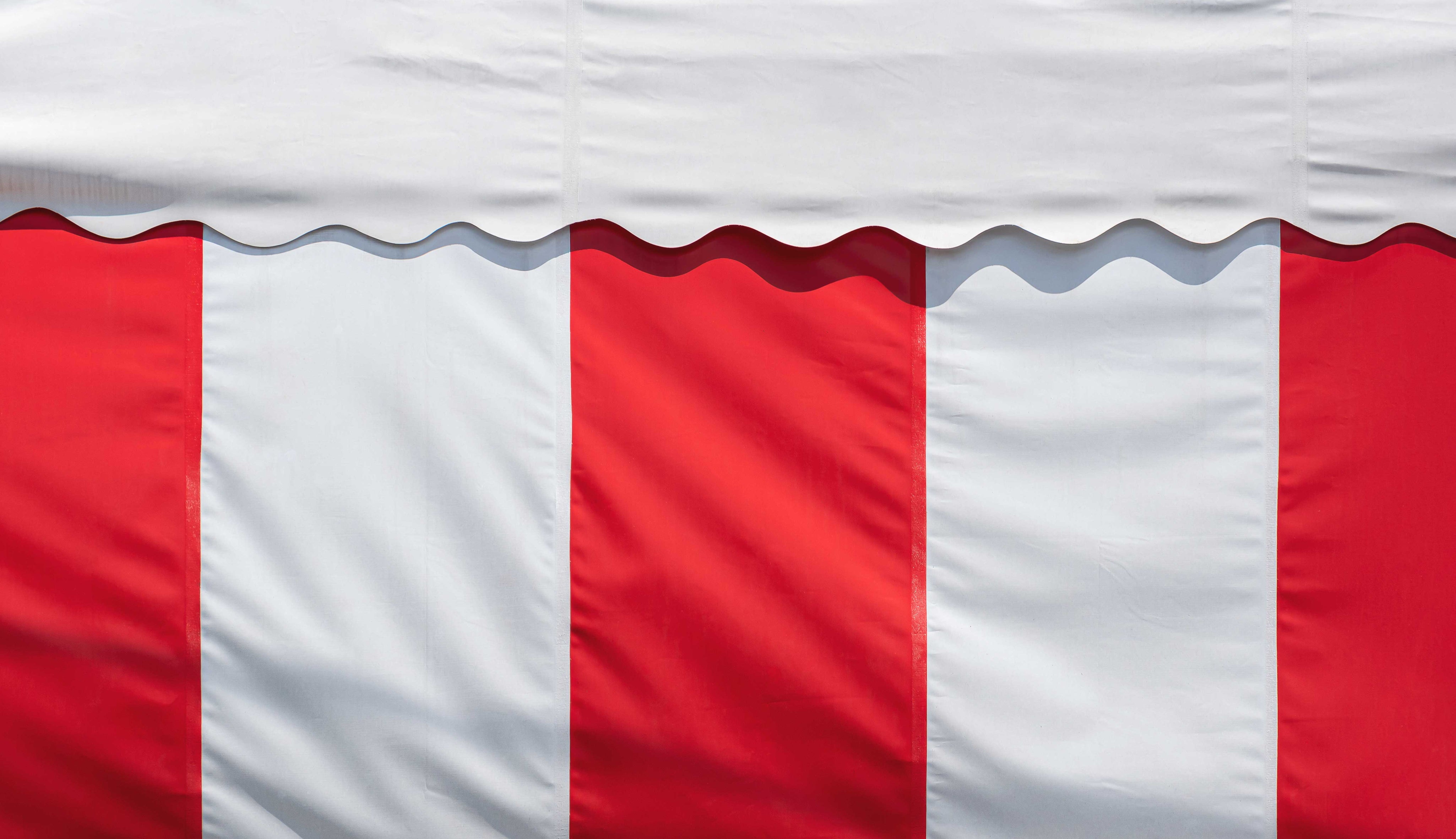 background-of-red-and-white-striped-canvas-awning-2025-03-11-02-50-49-utc.jpg